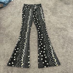 Black flared leggings with flowers